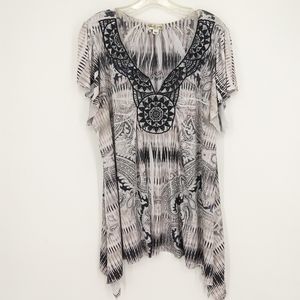 A32 WORLD UNITY 2X EMBELLISHED PATTERNED ASYMMETRICAL TOP
